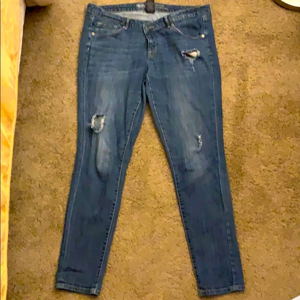 Slightly worn jeans.